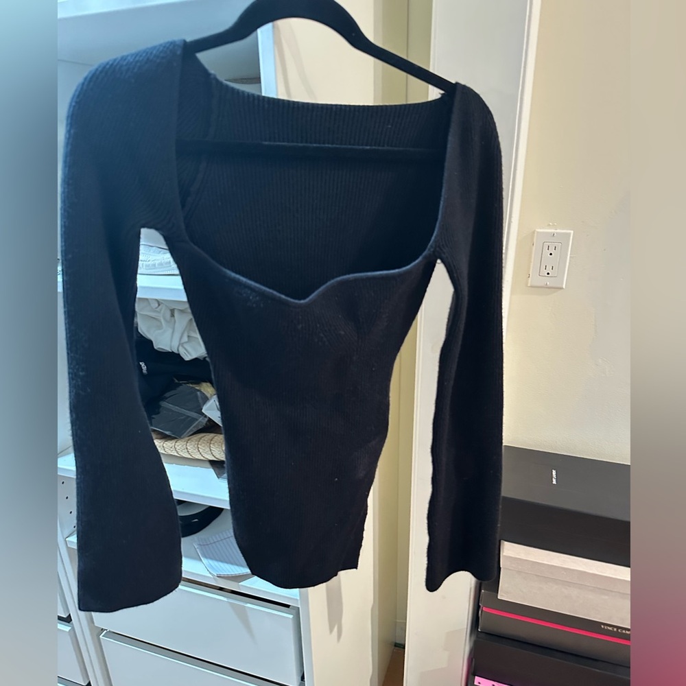 Black sweater with sweetheart neckline